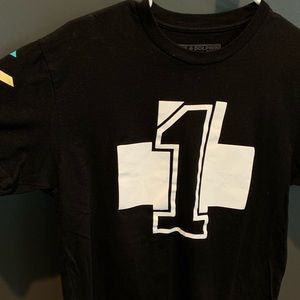 Black and white pink dolphin shirt.